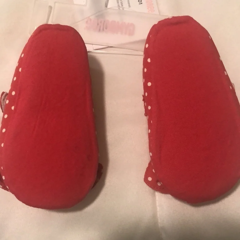 NWT set of 2 baby onesies and size one baby shoes